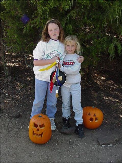 Stephanie & Kara Boldt with pumpkins & cooking trophy.JPG